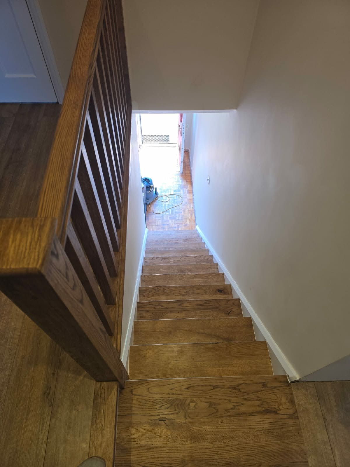 Bespoke oak balustrade fitted to an open-plan staircase and landing