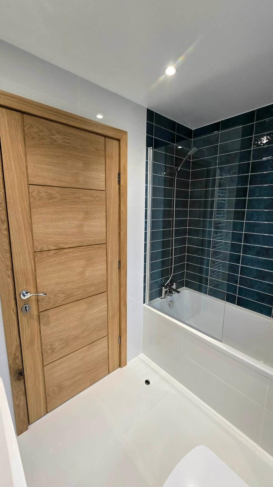 Painted MDF door lining fitted in a hallway