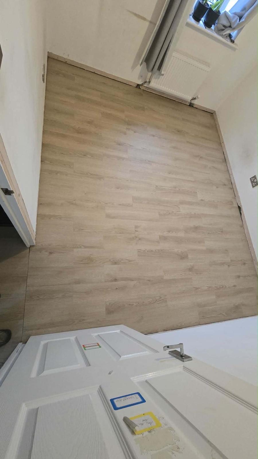 Solid oak flooring installation in a living room