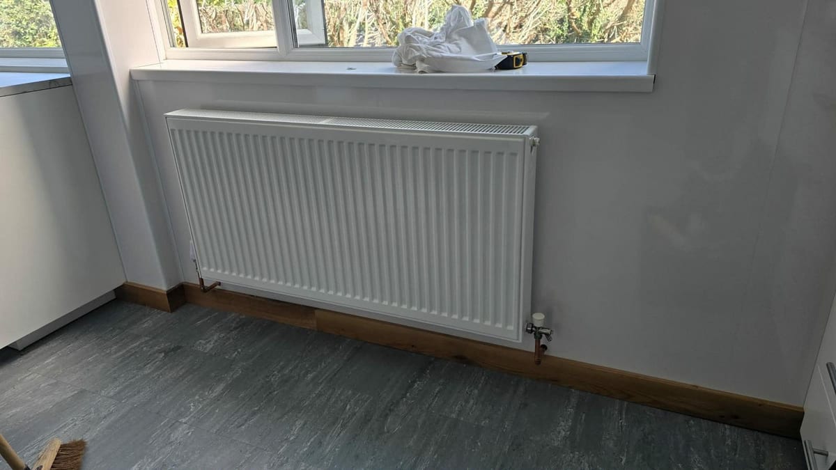 Painted MDF skirting board in a renovated lounge