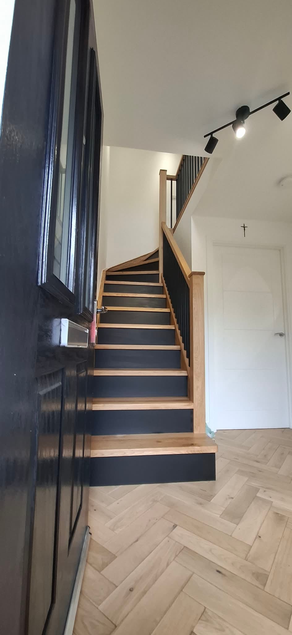 New oak treads and risers laid over an original staircase, natural grain finish