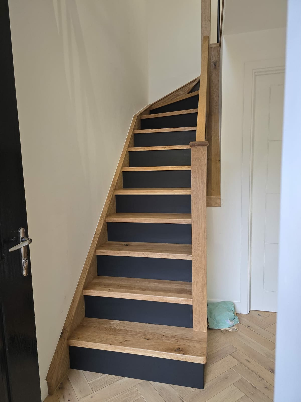 Oak staircase overlay with matching newel post and handrail