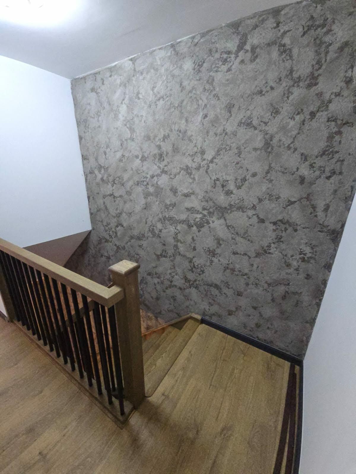 Top landing balustrade and staircase turn finished in solid oak