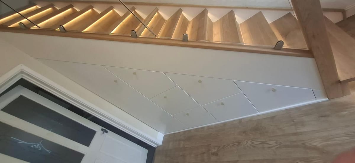 Bespoke under-stair storage with fitted drawer fronts